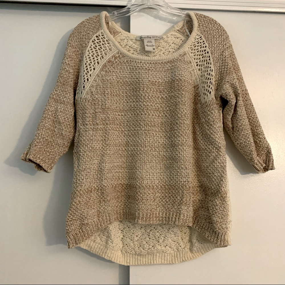 Beige sweater with lacy back